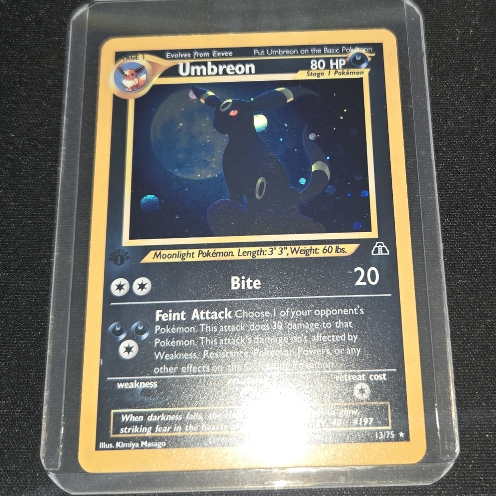 Pokémon Umbreon  Replica Holographic Card. Comes with plastic protective sleeve.